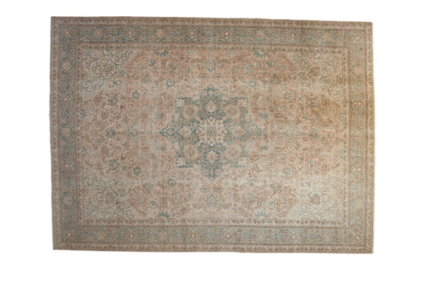 Distressed Persian Tabriz carpet, central floral medallion, ivory and dusty blue, 9x12'.
