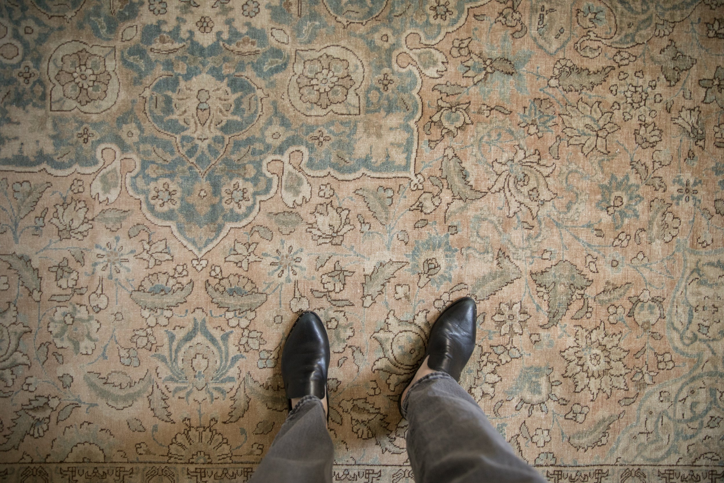 Distressed Tabriz rug with central floral medallion, ivory and dusty blue field, 9x12.