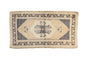 Distressed Oushak rug mat with faded navy blue medallion, cream, ivory, and beige motifs.