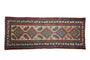 Antique Persian Serab runner: beige field, repeating serrated medallions, herder motifs, red and blue borders.