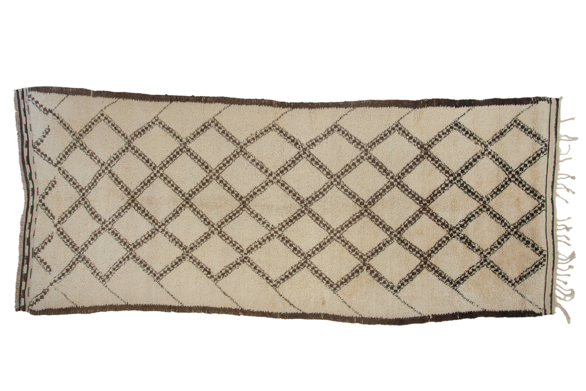Hand knotted vintage Moroccan carpet with plush ivory and cream field, brown diamond trellis.