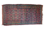 Vintage Moroccan runner rug with dusty raspberry starbursts, deep ink blue, mint green zig-zag border.