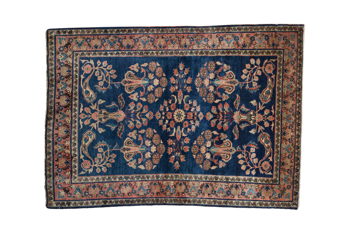 Vintage Mohajeran Sarouk rug: cobalt blue field, floral and paisley motifs, palmette border, 3'4" x 4'9".