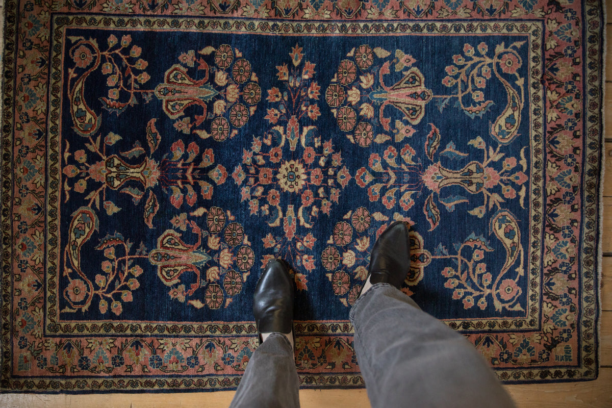 Vintage Mohajeran Sarouk rug: cobalt blue field, floral bouquets, paisley botehs, dragon-vine border.