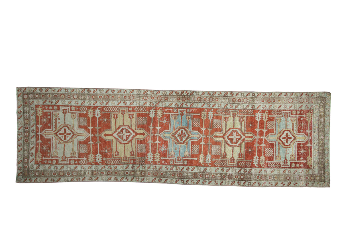 Antique Distressed Karaja Persian runner, madder red field, geometric medallions, beige, slate blue. 3'4" x 10'11".