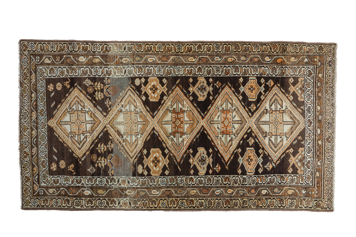 Vintage Distressed Hamadan runner, prominent diamond medallions, rich charcoal, brown, beige, gold tones, 3'2" x 5'11".