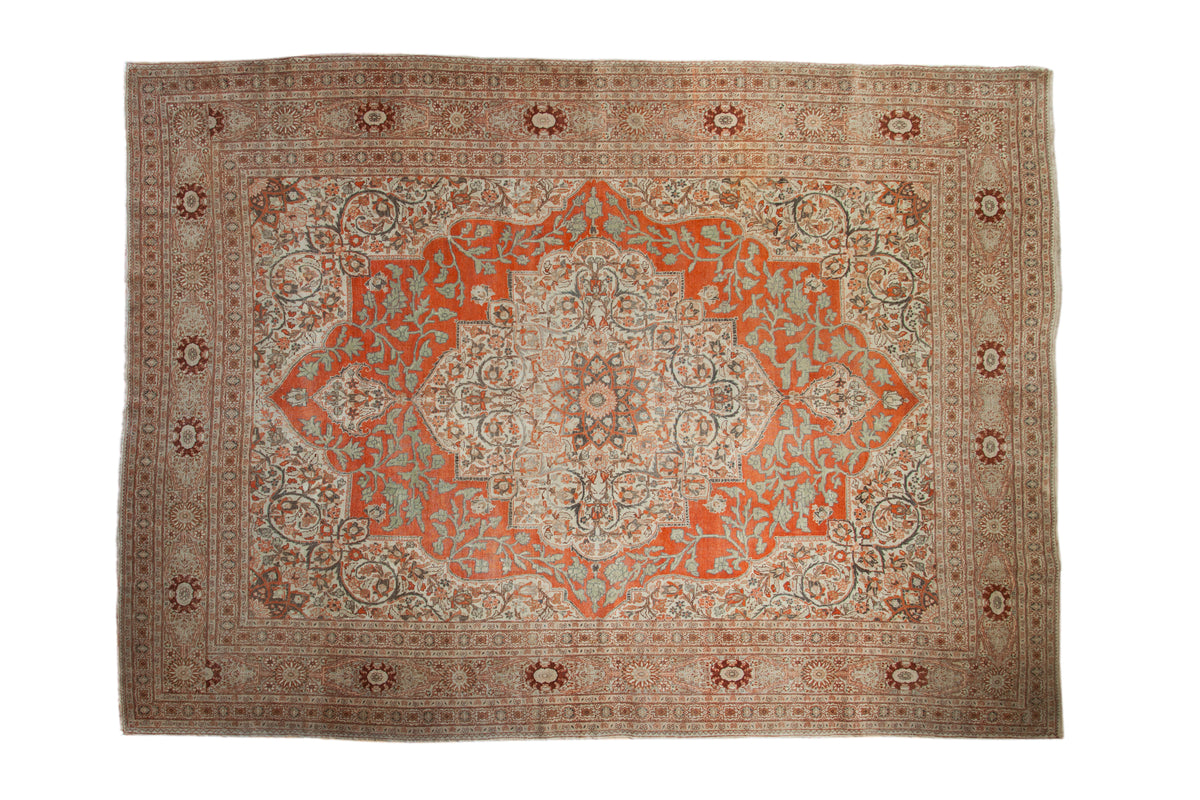 Vintage Tabriz carpet, rust medallion on ivory field with floral vines and book cover corners, 9'5" x 13'2".