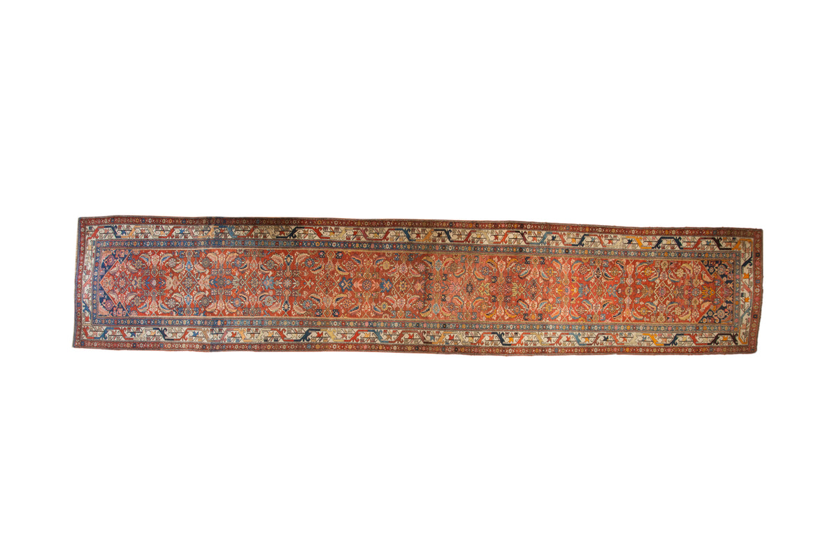 Antique Persian Bijar runner, unusually colorful Herati motif, madder red field, meandering border, 3'6" x 19'.
