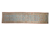 Distressed vintage Northwest Persian runner rug featuring abrash blue Herati field, red borders, 3'10