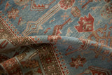 Distressed vintage Persian rug runner pile texture with sky blue abrash and red Herati motifs.