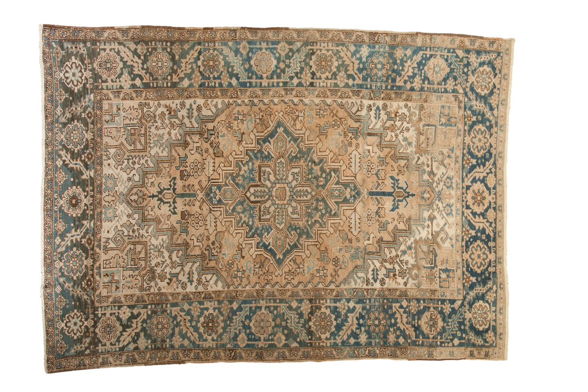 Vintage Distressed Heriz Carpet with central diamond medallion in sand and dusty blue-green.