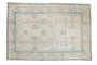 Vintage Distressed Tabriz carpet, pale allover floral palmette field and muted blue borders.