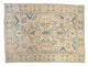 Vintage Distressed Tabriz carpet with ivory field, sapphire blue cloudband medallion, 7'5" x 10'.