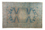 Distressed vintage Persian Veece carpet, hexagonal medallion, denim blue, dusty terra cotta.