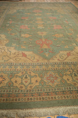 Low angle view of the Indian Soumac carpet's detailed border and short ivory fringe.
