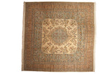 Vintage Kerman design square carpet with a floral medallion, ivory center, and pale blue and beige borders.