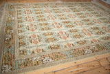 Embossed floral cross sections and William Morris style border on a vintage Spanish rug.