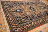 Vintage Ardebil carpet border with intricate floral and geometric motifs in peach, navy, ivory.