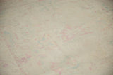 The distressed texture and short, even pile of the vintage Polonaise carpet.