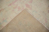 Detail of the hand-knotted foundation and short pile on a vintage distressed Polonaise carpet.
