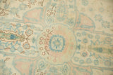 Distressed Herati motif with delicate outlines, pale blue, and dusty rose abrashes.