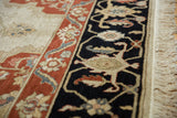Vintage Armenian Serapi rug's dark navy border with elaborate floral palmettes and fringed end.