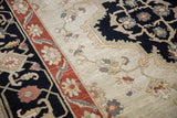 Armenian Serapi carpet with scalloped contours, floral palmettes, and vine motif in navy, terra cotta.