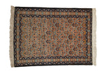 Vintage Ardebil rug with a rust lattice field featuring botehs and floral motifs in navy, sky blue, and yellow.
