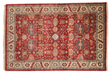 Vintage Indian Heriz carpet in cherry red with a geometric floral pattern and central medallion.