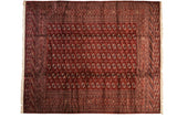 Vintage Bokhara carpet with a dense, repeating pattern of gul medallions in wine red, navy, and ivory.