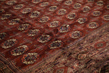 High sheen and soft, silk-like pile on a vintage wine-red Bokhara carpet.