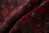 Plush, silk-like wool pile with a high sheen on a vintage red Bokhara runner rug.