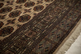 Original side cord selvage and intricate geometric border on a fine Bokhara carpet with ivory fringe.