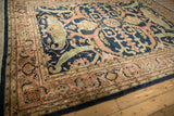 Intricate terracotta main border and side selvage of the vintage Pakistani Serapi rug.