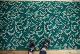 Lush, carved pile of a William Morris design rug with serrated leaves in jade and teal.