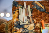 Textured cochineal red and sapphire blue hand-knotted pile of a late 19th century Kerman rug fragment.