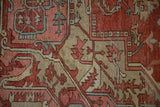 Close view of the antique Serapi's Samovar border, highlighting the textured pile and serrated motifs.