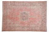 Vintage Distressed Sparta Carpet with soft pink field, starburst medallion, dragon motif borders. 7'3