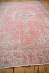 Distressed pile texture with exposed foundation and short fringe on the Sparta rug.