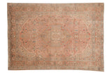 Distressed vintage Isparta carpet with hexagonal medallion, floral vinery, dusty rose and beige tones, 6'7