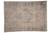 Distressed Turkish Sparta carpet, ornate quatrefoil medallion, ivory and dusty blue tones, 7'5