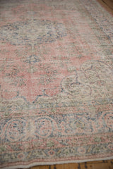 Distressed vintage Sparta carpet detail, showing wear to knot heads and foundation.