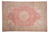 Distressed Turkish Sparta rug, raspberry pink and ivory scalloped medallion, floral field.