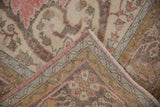 Worn pile, exposed foundation, and secure selvage of a vintage Sparta rug.