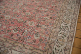 Distressed dusty red rose field and ivory border showcasing delicate floral vinery.