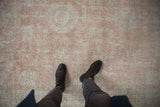A look down at the distressed, low-pile texture of a vintage Sparta carpet.