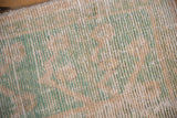 Shaggy, distressed pile of a vintage Turkish Tulu rug showing visible wear and exposed foundation.
