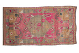 Distressed Oushak rug with vibrant hot pink field, faded grey patterns, and abrashed finish, 2'10