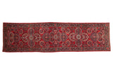 Vintage Dargezine rug runner featuring cherry red field, millefleur vinery, and floral bouquets, 2'6