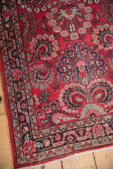Vintage Dargezine runner fringe, side selvage, cherry red field, and low pile texture.